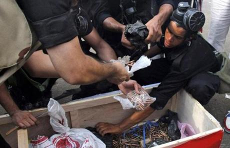 Egyptian security forces uncovered a box of ammunition, which they claimed to have found in one of the two pro-Morsi sit-in sites.
